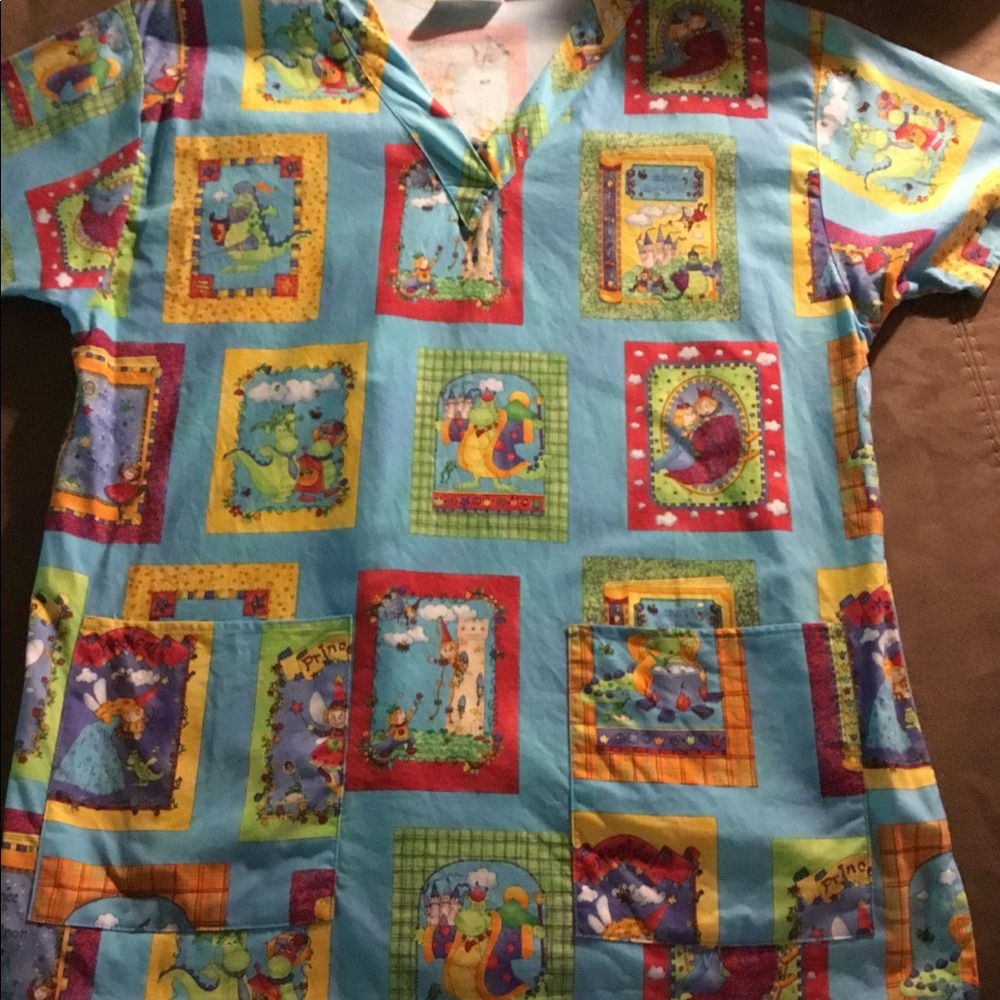 Aqua blue scrub top with dragons and handmaidens